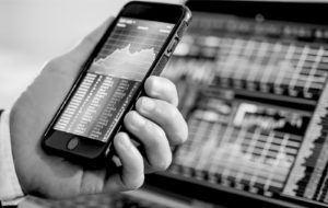 Smartphone showing hypothetical financials